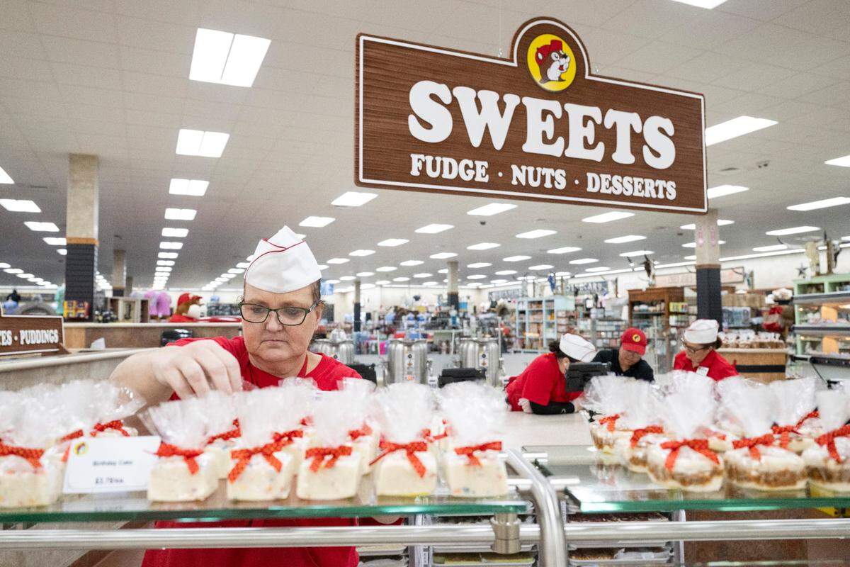 Workers sweets before the opening of Buc-ee’s first Mississippi location, located in Harrison County, on Monday, June 9, 2025.