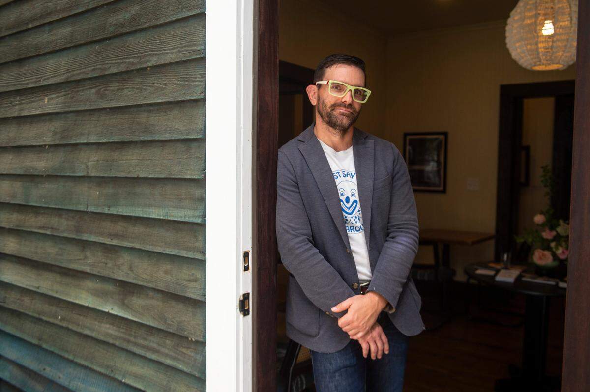 Julian Rankin, executive director of the Walter Anderson Museum of Art, stands in the doorway of The Traveler, a new extension to the Walter Anderson Museum of Art, in Ocean Springs on Wednesday, April 16, 2025.