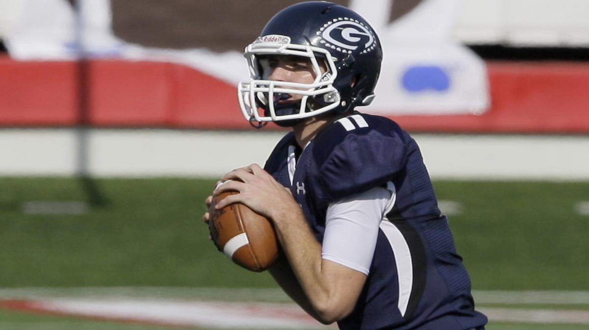 Greenwood High School quarterback Jabe Burgess looks for a receiver during the first half of the Arkansas Class 6A High School Football Championship game against Pine Bluff High School in Little Rock, Ark., Saturday, Dec. 1, 2012. (AP Photo/Danny Johnston)