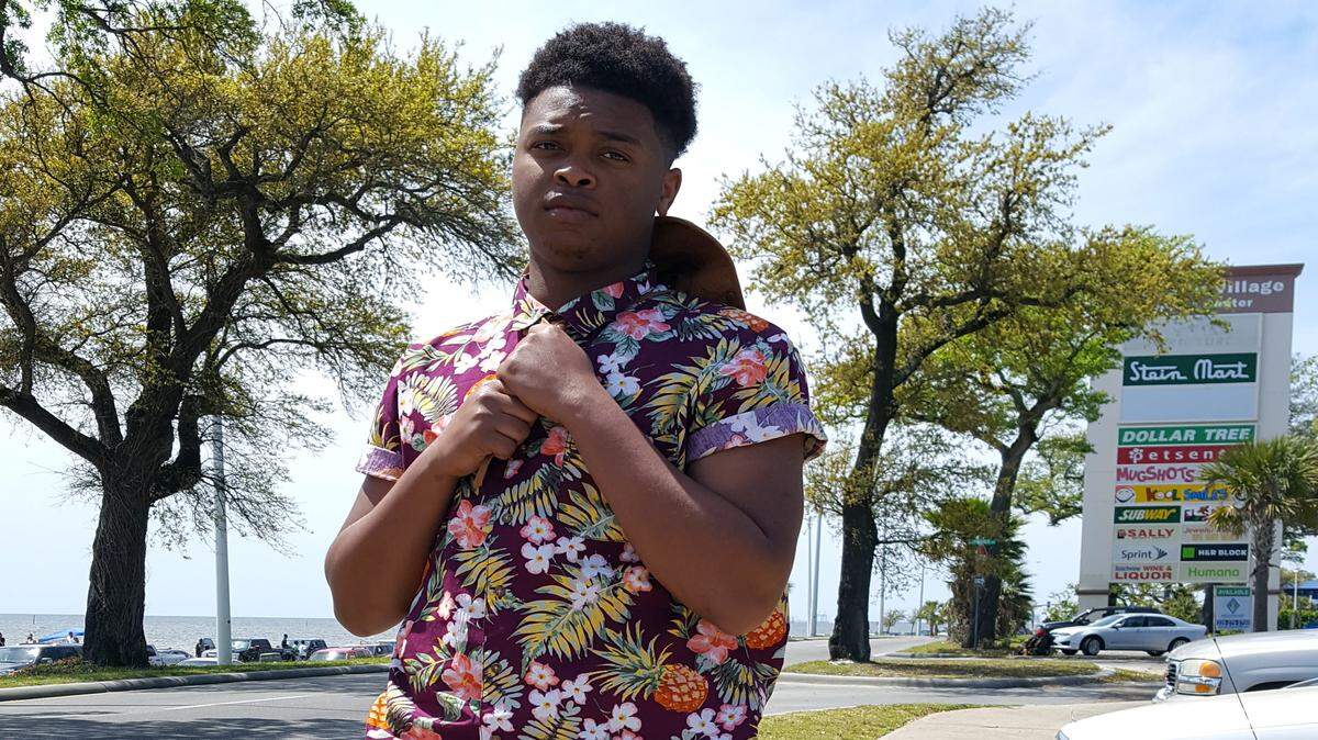 SHANNON DAVIDSON/SPECIAL TO THE SUN HERALD 
 Colby Watts of Hattiesburg, wearing a floral patterned button up with fringe jean shorts.