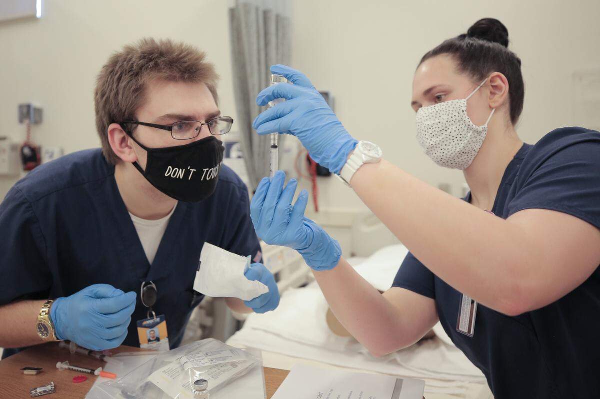 A Mississippi Gulf Coast Community College nursing student works with an instructor in a skills lab Thursday, March 4, 2021.