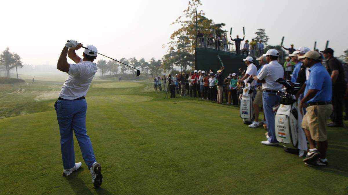 WOOHAE CHO/ASSOCIATED PRESSInternational team player Jason Day watches his tee shot on the 7th hole during a practice round ahead of the Presidents Cup golf tournament at Jack Nicklaus Golf Club Korea in Incheon, South Korea, Wednesday.