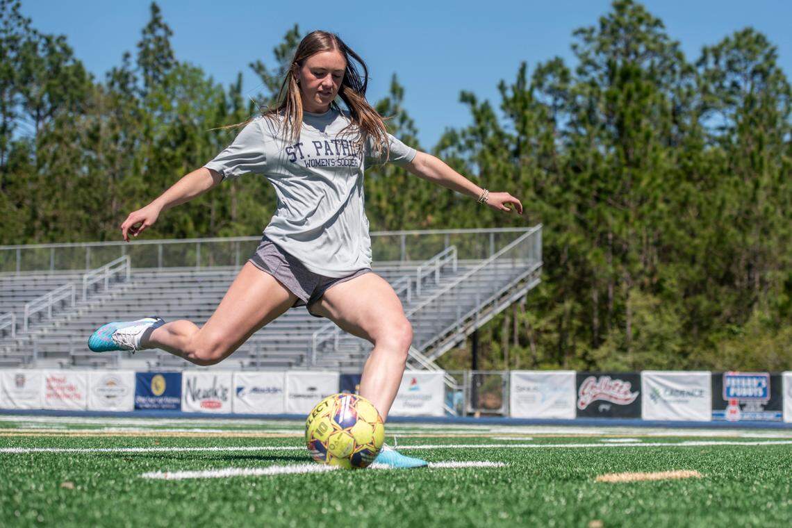 St. Patrick’s Isabella Jordan, a sophomore who plays striker, shoots on goal during practice at St. Patrick Catholic High School on Thursday, March 28, 2024.