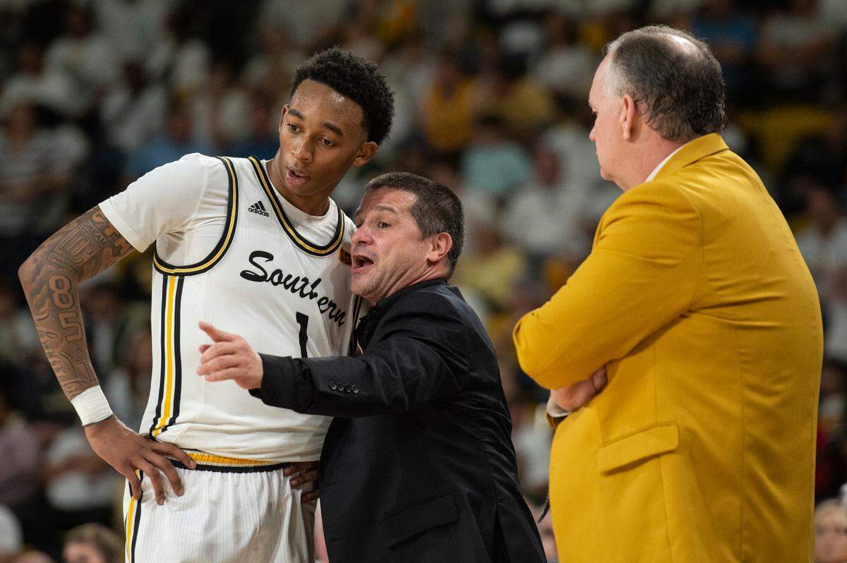 Southern Miss Assistant Coach Juan Cardona coaches Southern Miss’s Austin Crowley during a game against Louisiana-Lafayette at Reed Green Coliseum on Thursday, Feb. 9, 2023.