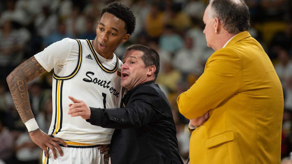 Southern Miss Assistant Coach Juan Cardona coaches Southern Miss’s Austin Crowley during a game against Louisiana-Lafayette at Reed Green Coliseum on Thursday, Feb. 9, 2023.