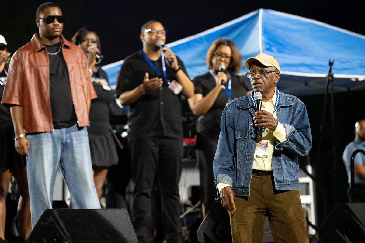 Daniel Stallworth’s father sings during Tuesday’s concert in Moss Point.
