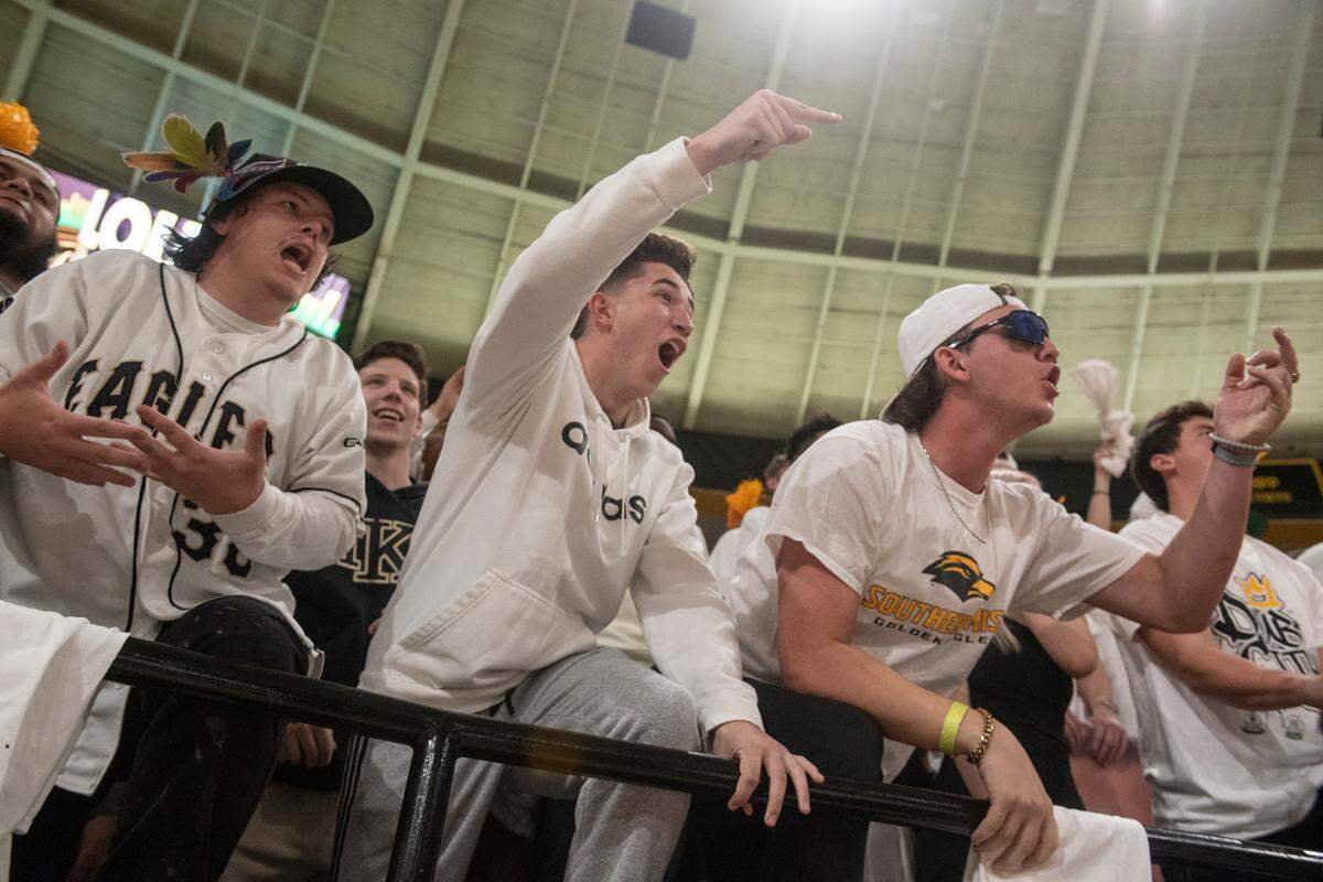 Southern Miss fans cheer during a game against Louisiana-Lafayette at Reed Green Coliseum on Thursday, Feb. 9, 2023.