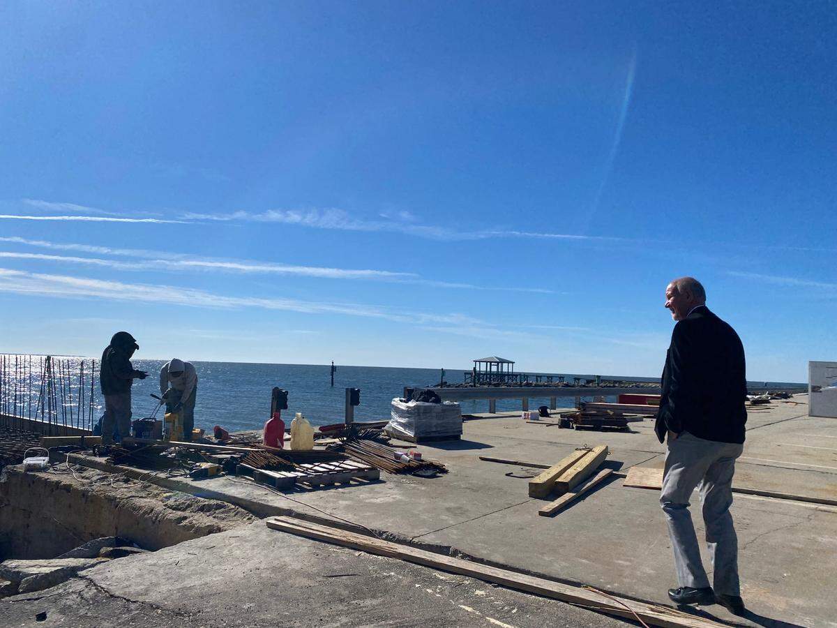 Long Beach Mayor George Bass walks through the city’s harbor on Friday, Dec. 6, 2024. The city is adding walls around the harbor to protect it from damaging wave action during hurricanes. Bass said Long Beach is using federal grants, BP oil spill settlement money and state Tidelands funds for the ongoing construction.