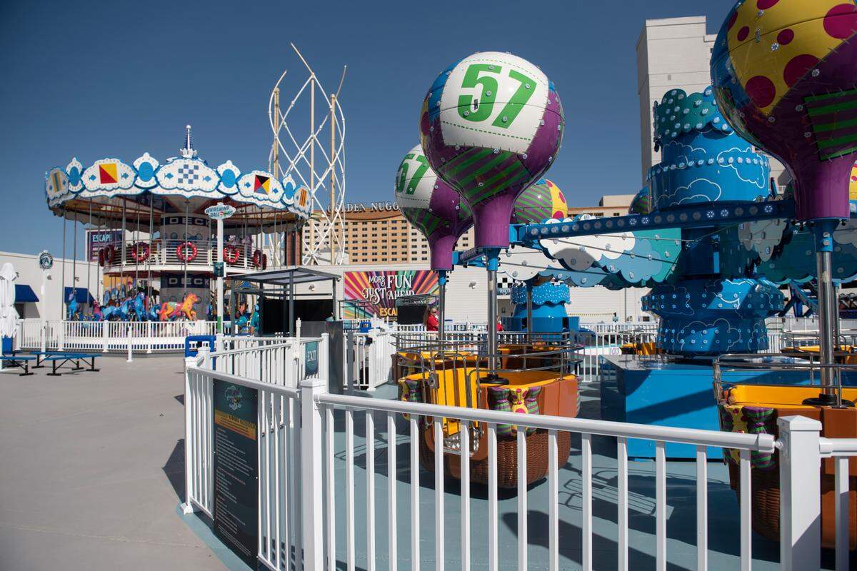 Rides during the grand opening of Paradise Pier amusement park at Margaritaville in Biloxi on Friday, March 3, 2023.