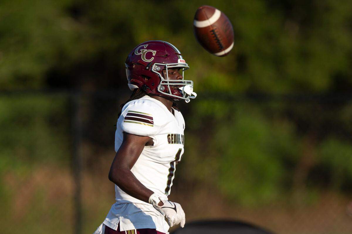 George County wide receiver Brenn Moody tosses the ball after scoring a touchdown during a Jamboree game against St. Martin at St. Martin High School in Ocean Springs on Friday, Aug. 23, 2024.