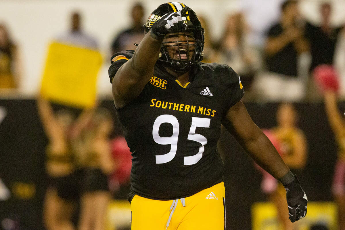 Southern Miss Golden Eagles defensive tackle Quentin Bivens (95) celebrates after a tackle during a game against Arkansas State at M.M. Roberts Stadium in Hattiesburg on Saturday, Oct. 15, 2022.
