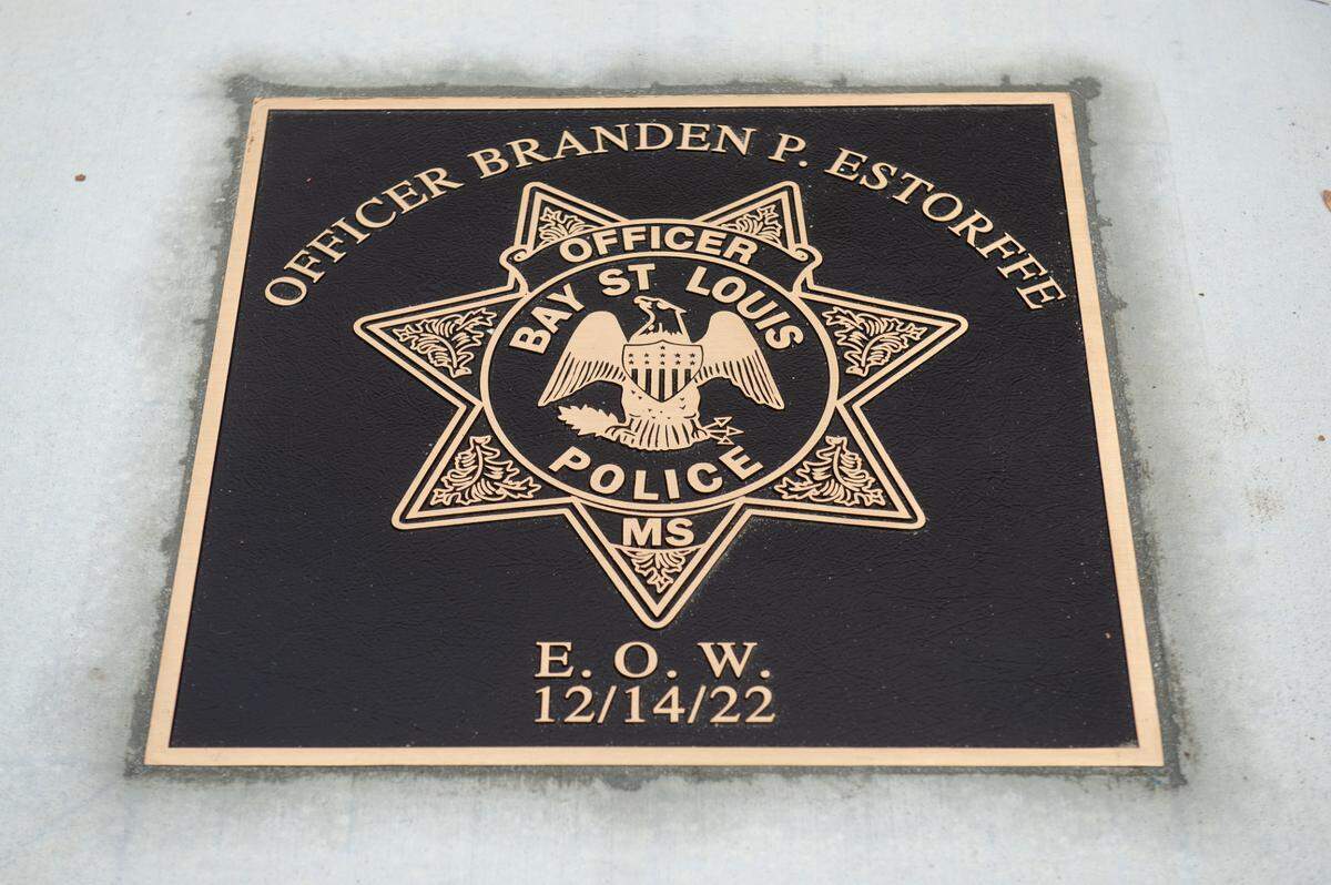 A commemorative star in honor of Officer Branden Estorffe outside the new Bay St. Louis Police Department in Bay St. Louis on Thursday, Dec. 14, 2023. Different from other commemorative stars in Bay St. Louis, the one honoring Estorffe has seven points, matching the seven point star Bay St. Louis officers wear.