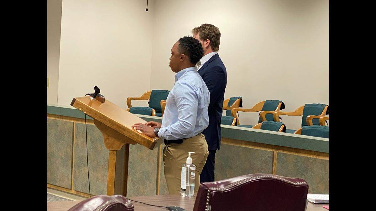 Ex-Moss Point police Officer Eric Maye appears in court Monday with his attorney, Cameron McCormick, by his side.