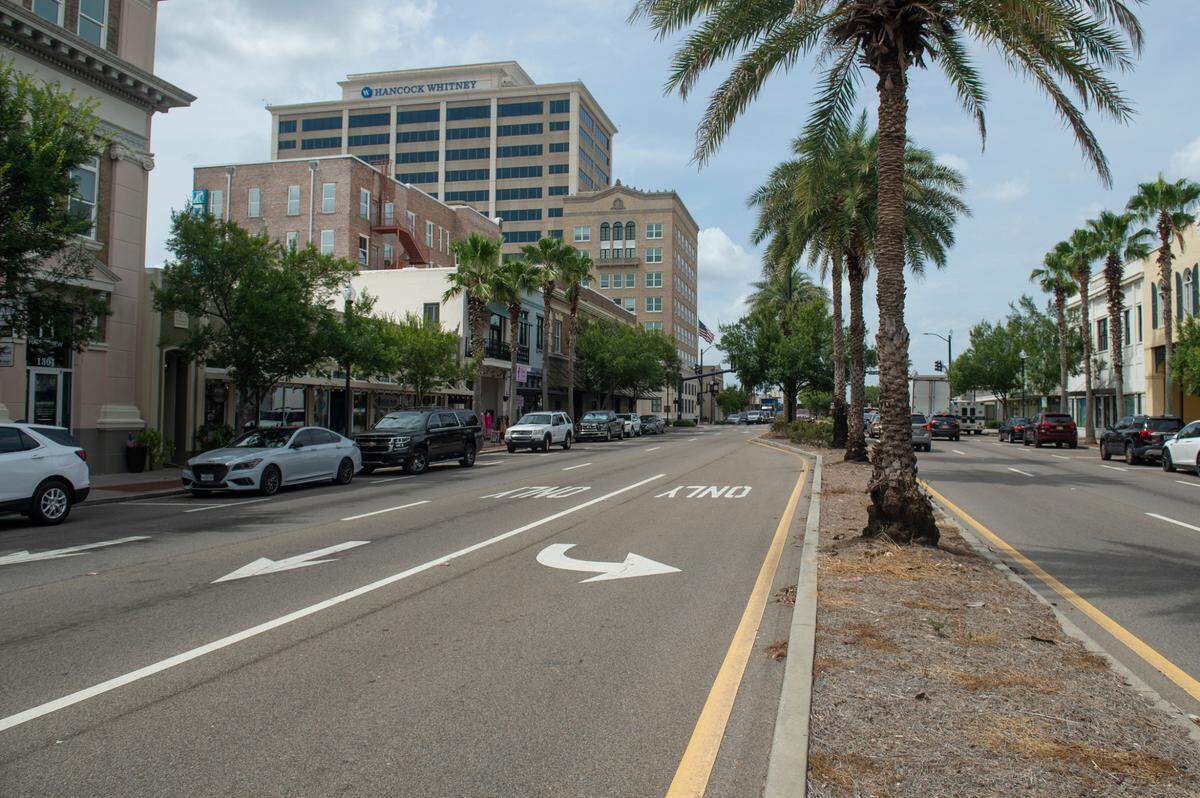 Present: The intersection of Highway 49 and 13th Street in Gulfport is dominated by Hancock Whitney Bank. In 2011, when Hancock Bank acquired Whitney Bank, the company renamed the corporate building from One Hancock Plaza to Hancock Whitney Plaza. In 2018, the company combined the two legacy bank brands. The Hancock Whitney Plaza campus is still the company’s corporate headquarters.