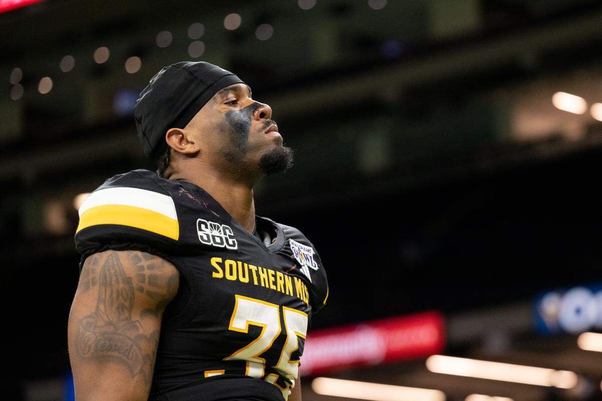 Southern Mississippi linebacker Chris Jones (35) walks off the field after losing the New Orleans Bowl at Caesars Superdome on Tuesday, Dec. 23, 2025. Western Kentucky won 27-16.