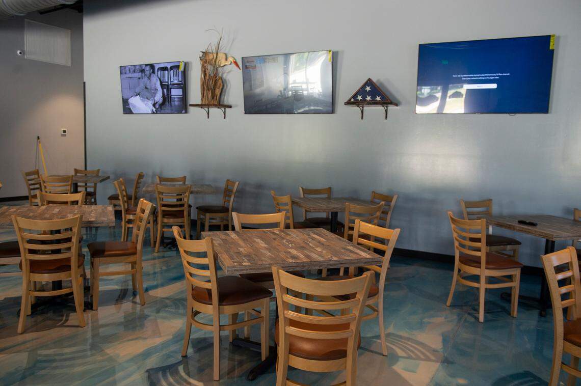 The dining area at Flatheads and Bottom Feeders in Woolmarket gives the area a place to dine on catfish and steaks and also a neighborhood place to meet friends.