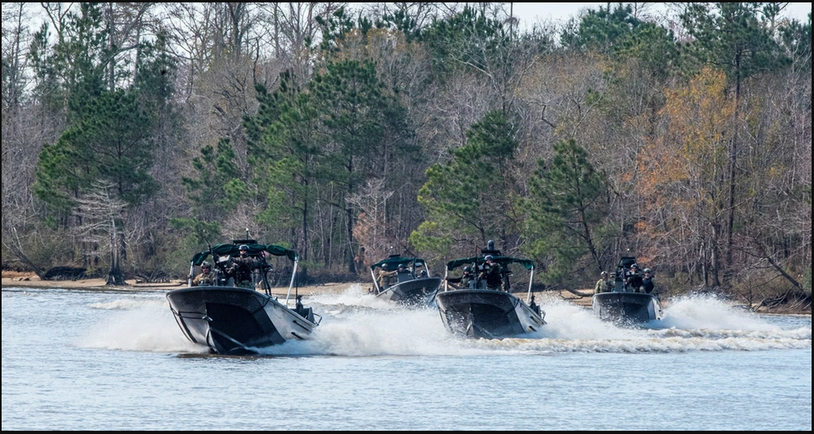 STENNIS SPACE CENTER, Miss. – A formation of riverine crafts sets out for training from Naval Small Craft Instruction and Technical Training School facilities located along the Pearl River in South Mississippi in support of Semester 22-2 training iterations. Semester 22-2’s recent formal graduation ceremony featured partner nation students from the Bahamas, Czech Republic, Estonia, Germany, Jamaica, Latvia, Mauritania, Mauritius, Poland, the Republic of Korea, Romania, and Ukraine. NAVSCIATTS is a security cooperation schoolhouse operating under U.S. Special Operations Command in support of foreign security assistance and geographic combatant commanders’ theater security cooperation priorities. (U.S. Navy photo by Michael Williams)