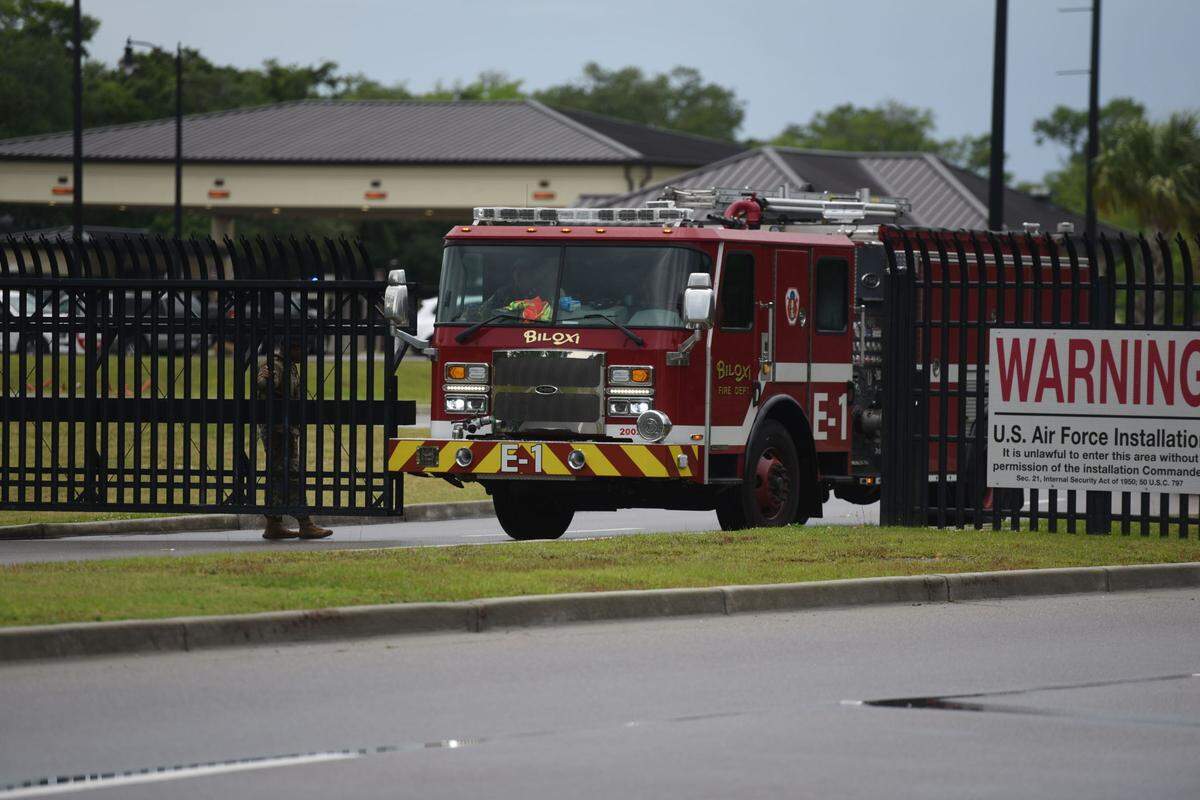 Emergency vehicles were seen leaving Keesler AFB on Wednesday after the base was locked down.