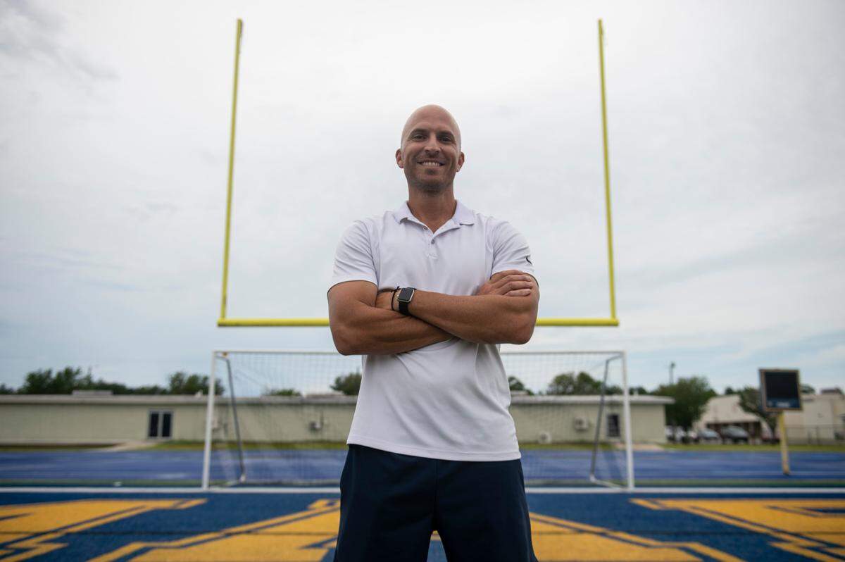 St. Martin football coach Ty Smith poses for a portrait at Joe Barlow Stadium in St. Martin on Wednesday, July 13, 2022.