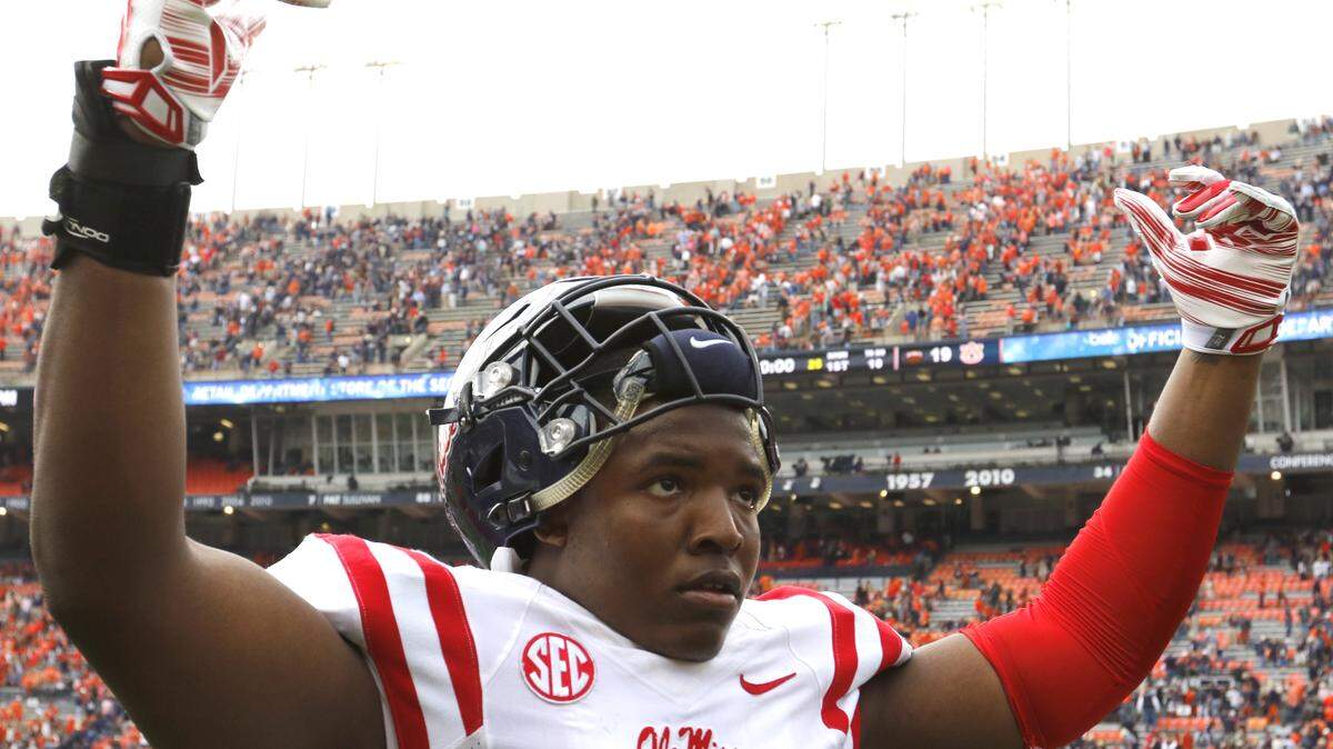 Mississippi defensive tackle Breeland Speaks (9) celebrates after they defeated Auburn 27-19 in an NCAA college football game, Saturday, Oct. 31, 2015, in Auburn, Ala. (AP Photo/Butch Dill)