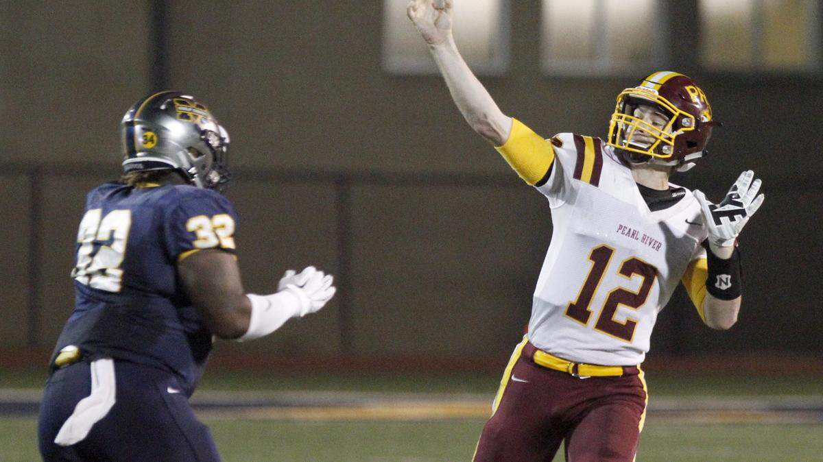 TIM ISBELL/SUN HERALDMGCCC defensive end Chris Johnson pressures PRCC quarterback Matt Williams last week. The Wildcats host Northeast at 2 p.m. Saturday.