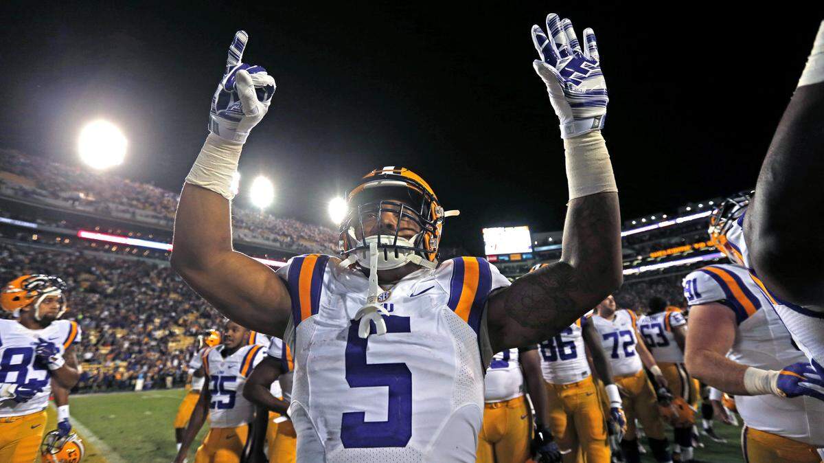 LSU running back Derrius Guice (5) celebrates after their NCAA college football game victory over Florida in Baton Rouge, La., Saturday, Oct. 17, 2015. LSU won 35-28. (AP Photo/Gerald Herbert)