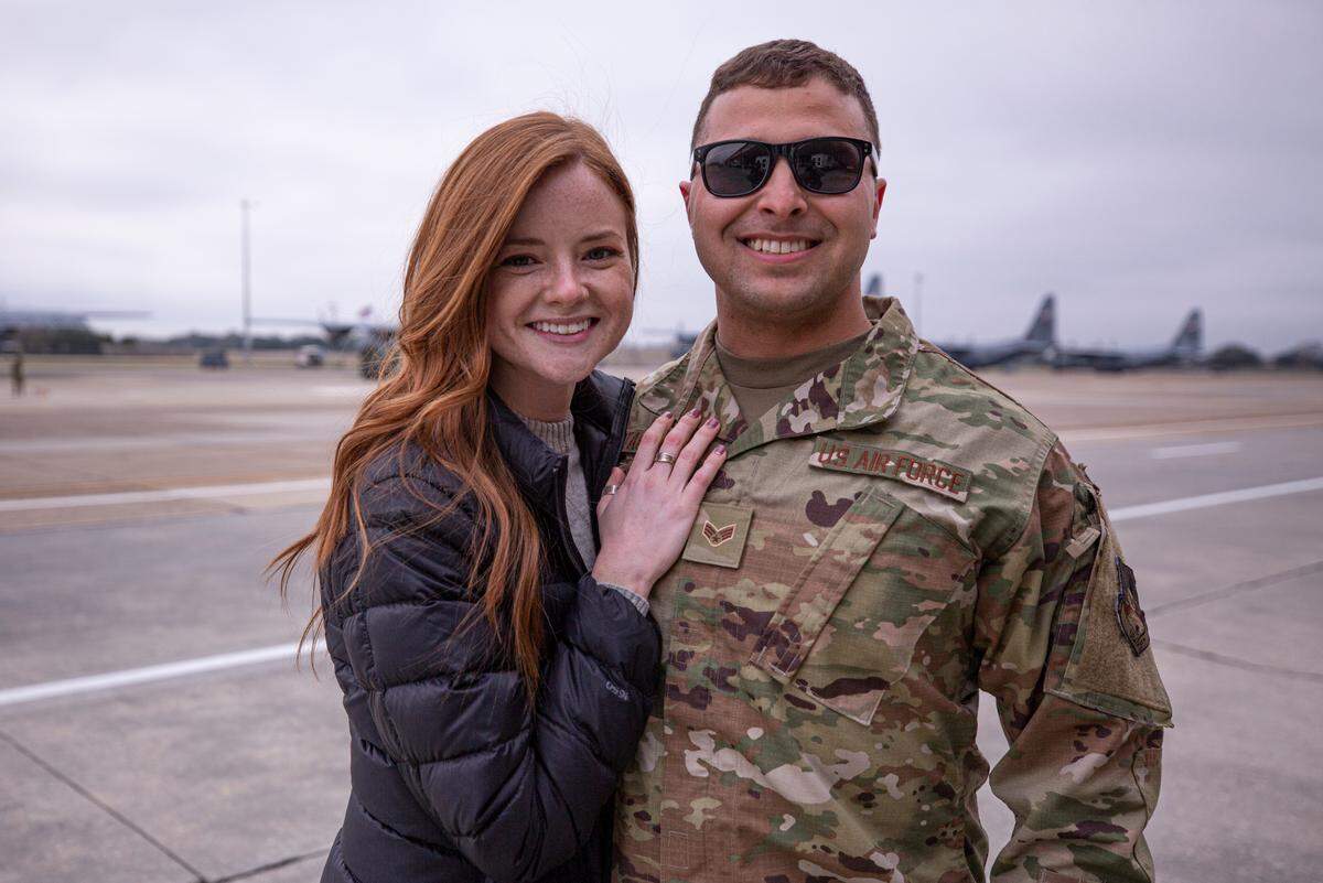 Megan Lucas (left) is reunited with her fiance Matt Matassa at the Keesler Air Force Base in Biloxi, Mississippi, Saturday, Feb. 13, 2021. The two got engaged a couple months before the airmen from the 815th Airlift Squadron and other members throughout the 403rd Wing were deployed to Southwest Asia in November 2020. 