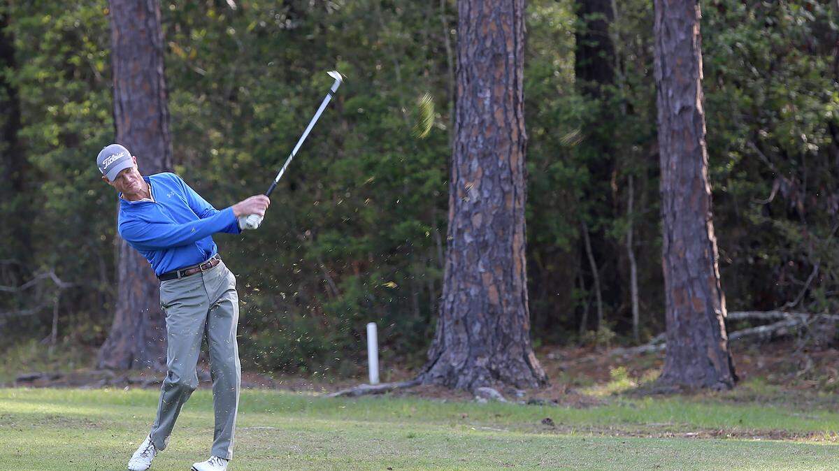 AMANDA McCOY/SUN HERALD 
 Joe Daley hits his ball onto the green from the fairway during the Mississippi Gulf Resort Classic Open Qualifier on Tuesday, March 29, 2016, at the Diamondhead Golf Course.