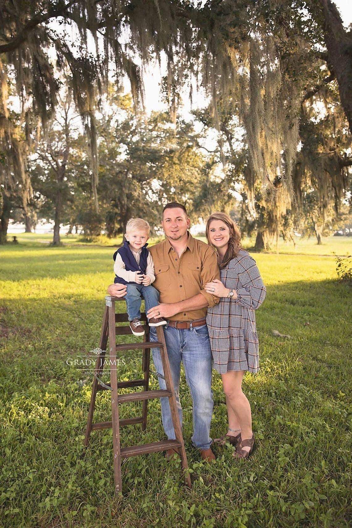Sawyer Scarborough, pictured with parents David and Lacy Scarborough, died in March 2022 in a drowning. David Scarborough is missing after a helicopter he was on crashed in the Gulf of Mexico.