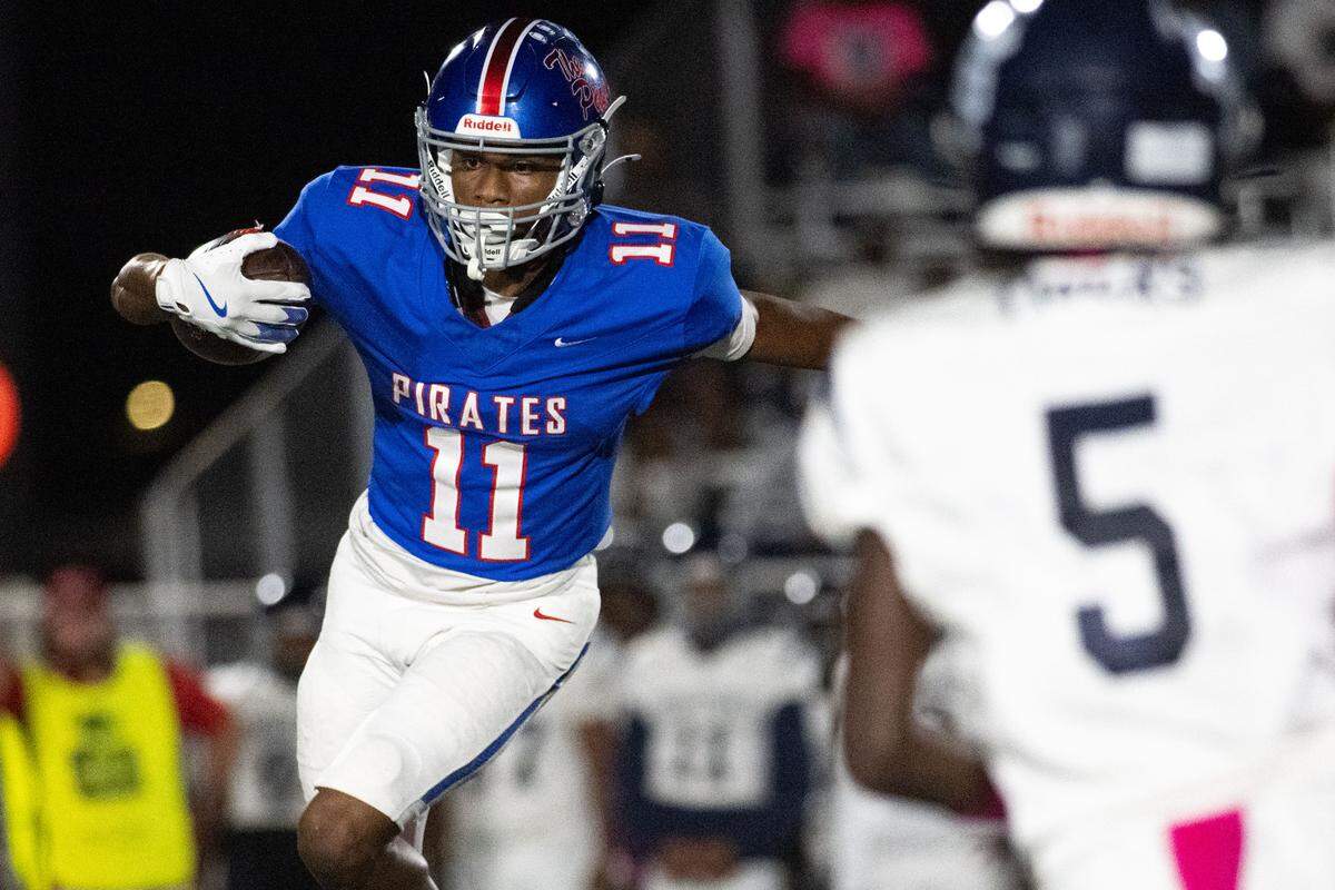 Pass Christian wide receiver Dwight Thomas (11), the state’s leading scorer among wideouts, had another big night Friday against Moss Point.