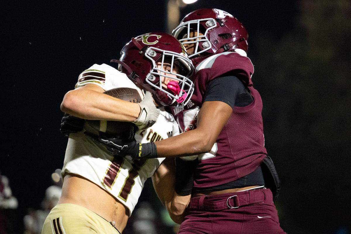 George County wide receiver Grant Reeves (11) is tackled by Picayune defensive back Kendall Jett (6).