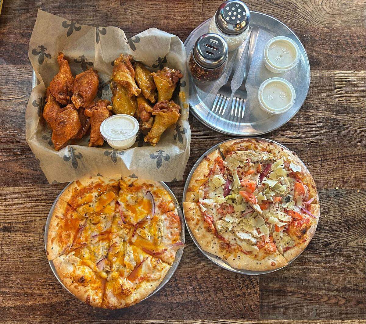 Pizza and wings from popular establishment Uncle Joe’s at its Diamondhead location.