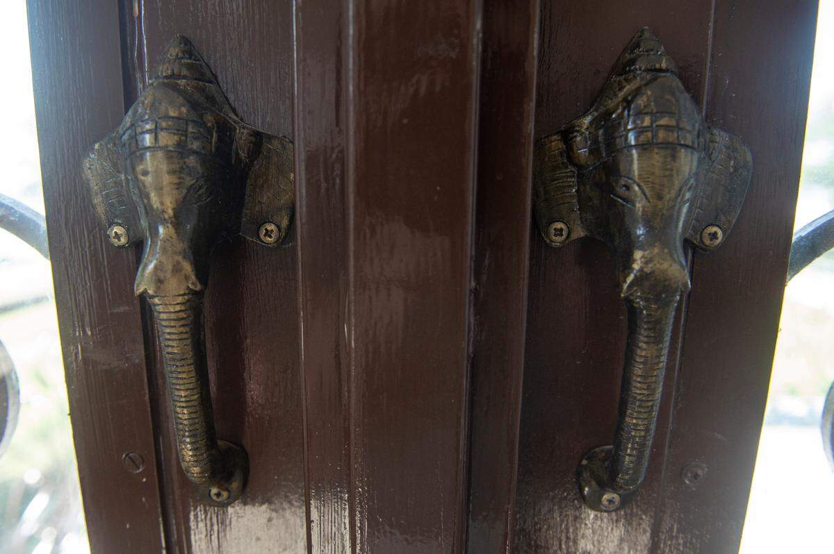 Elephant handles adorn the windows and doors of Binoy and Abha Mishra’s home on Scenic Drive in Pass Christian on Tuesday, May 16, 2023.