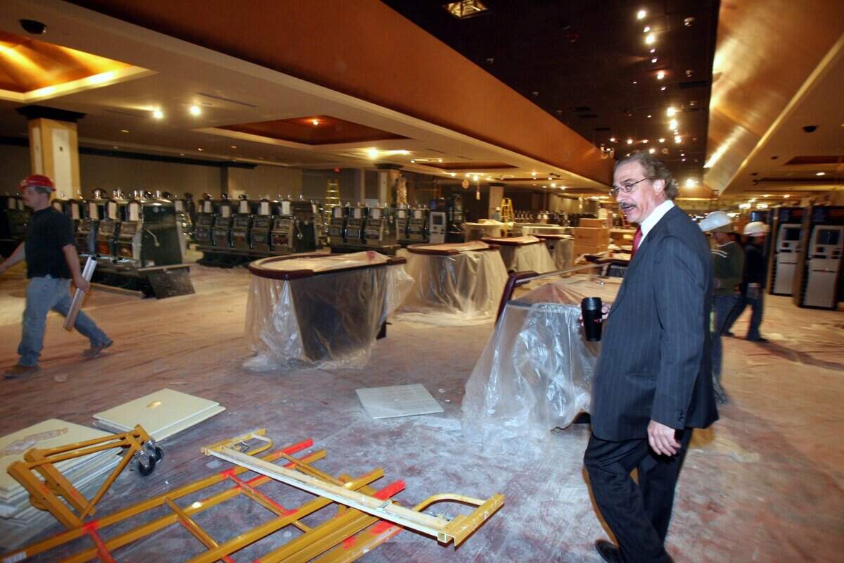 IP Casino General Manager Jon Lucas tours the first floor table and slot machine area of the Biloxi casino on Friday December 16, 2005. IP Casino was the first Coast casino to reopen after Hurricane Katrina.
