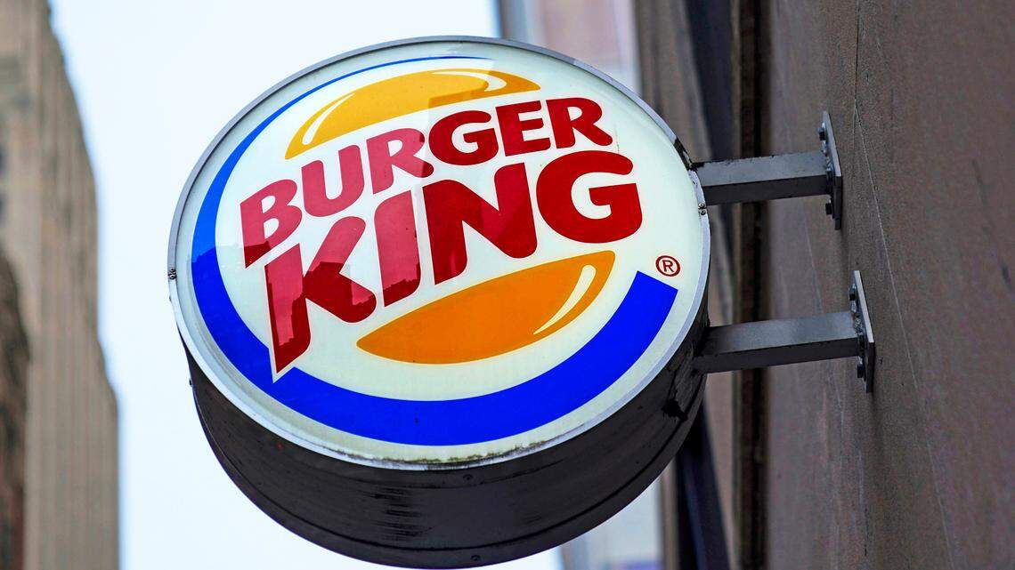 A Burger King employee accused of helping two armed men rob the restaurant in Rome, Georgia, has been arrested and charged, police say.
