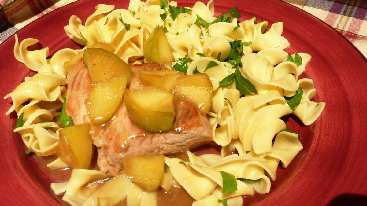 LINDA GASSENHEIMER/TNSBrandied apple pork comes with hot buttered egg noodles.