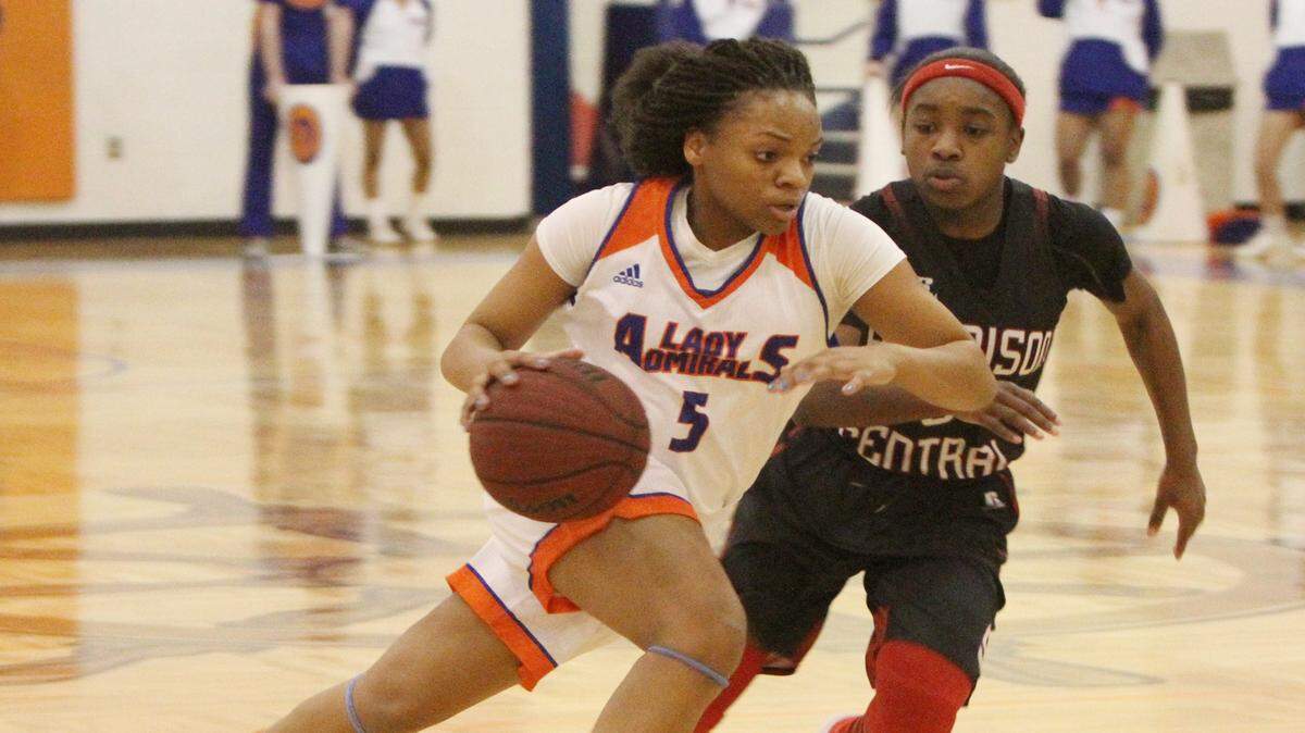 JOHN FITZHUGH/SUN HERALDGulfport's Amyjah Hardnett drives to the basket against Harrison Central's Chyna Allen during the first quarter of their game at Bert Jenkins gym in Gulfport on Friday Jan. 29, 2016.