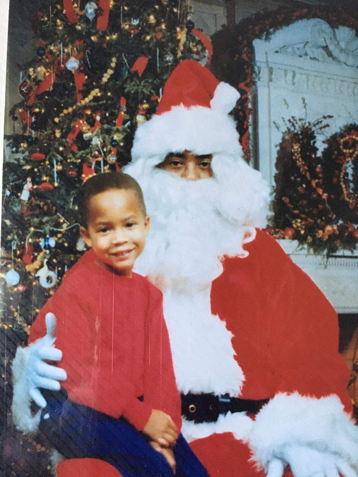 Derek Hillard poses with Santa at his Gulfport Head Start program in about 1988.
