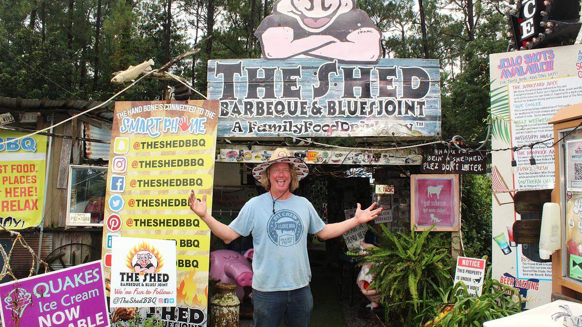 Brad Orrison, co-founder of The Shed BBQ, stands at the entrance of the BBQ and blues joint, located just off of Highway 57 in Ocean Springs.