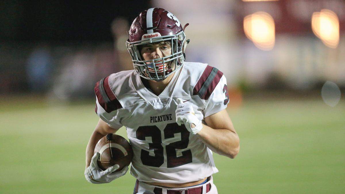 Picayune Nick Doane (32) makes a pass reception and runs into the end zone for a late score in the fourth quarter during the game between East Central and Picayune at East Central, Friday, September 27, 2019.