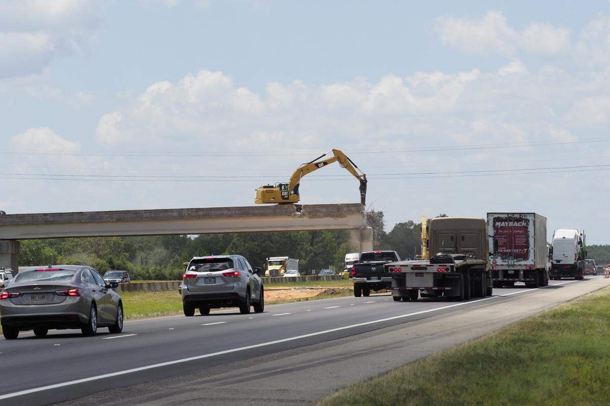 The span of the Menge Avenue overpass that extended over the westbound lanes of I-10 were demolished. Crews now will close the eastbound lanes of I-10 overnight to remove the remaining span.