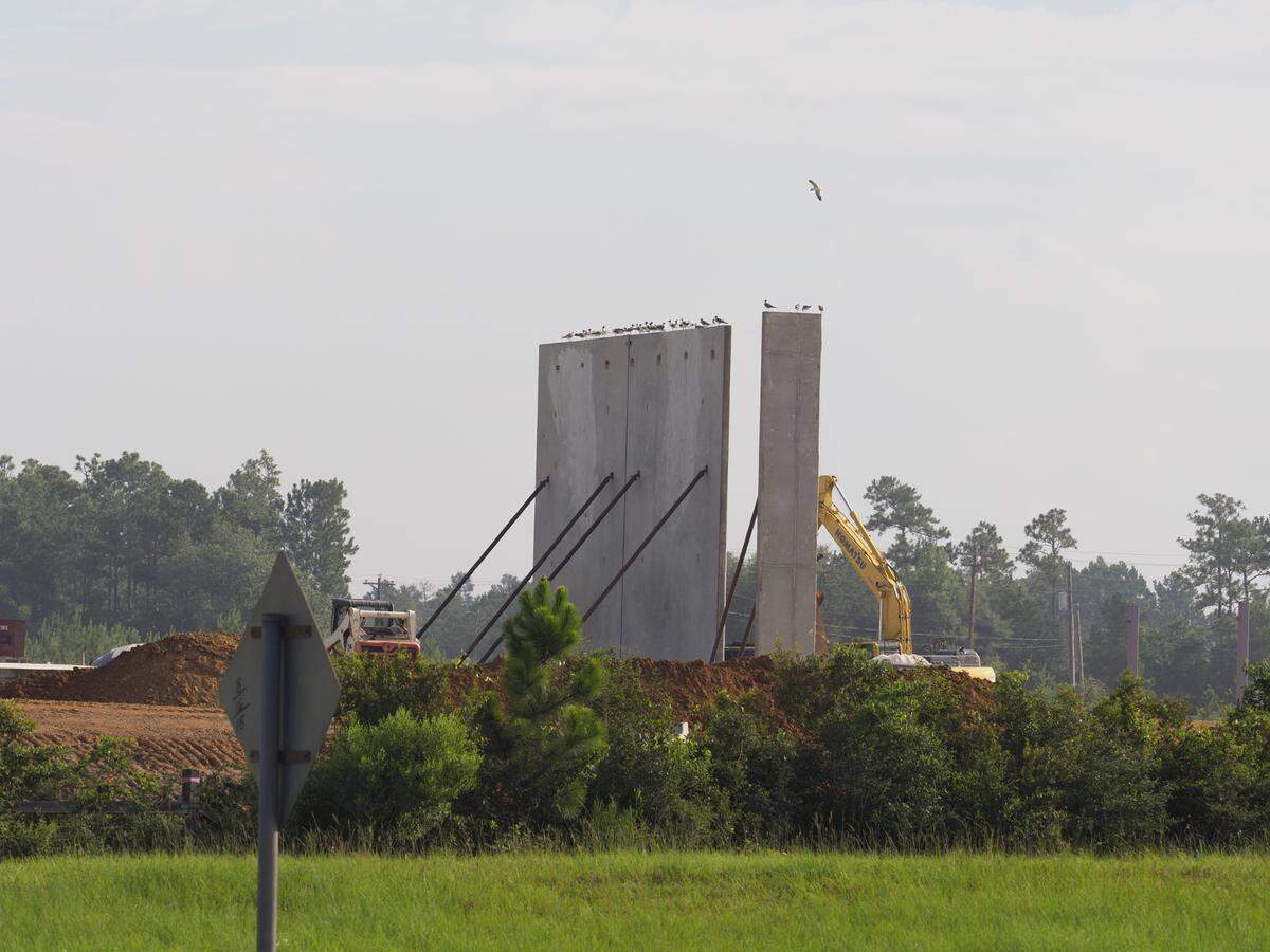Just in time for the July 4 travel weekend, a crane lifts the precast concrete walls of the the Buc-ee’s travel center under construction along I-10 near Gulfport, MS. The travel center is expected to open early in 2025 and has begun hiring managers.