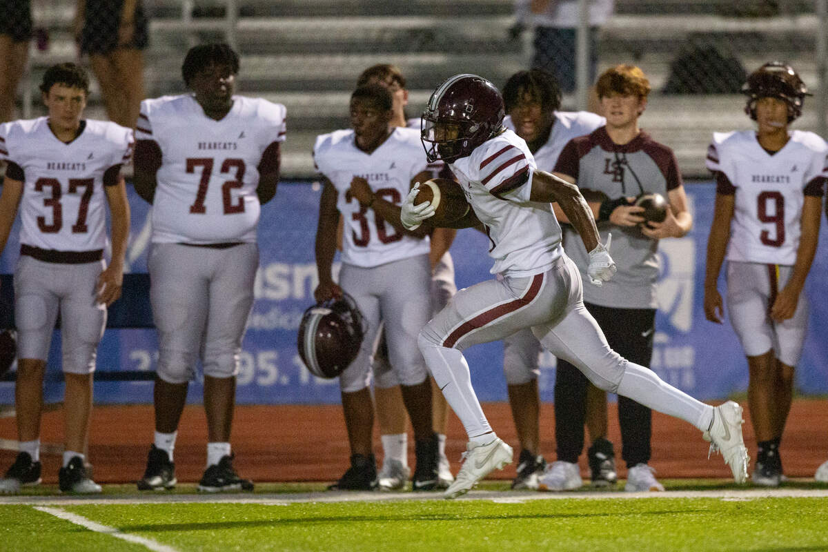 Long Beach’s Andre Windham runs the ball down the field during a game between Bay High and Long Beach at Tiger Stadium in Bay St. Louis on Friday, Sept. 13, 2024.