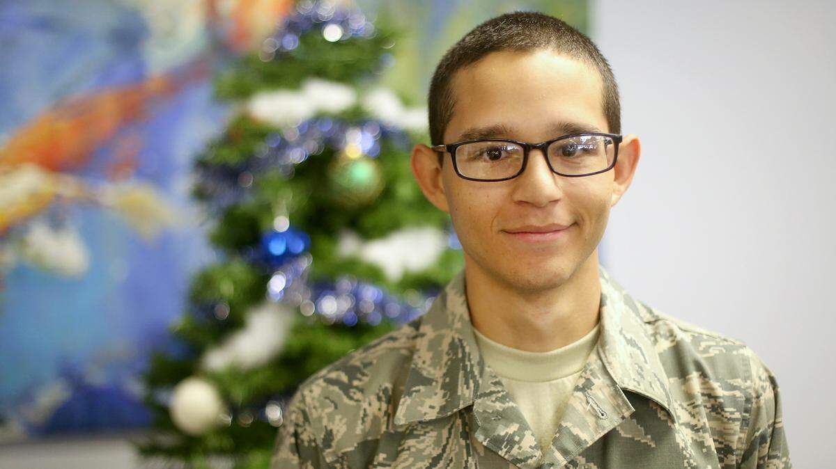 AMANDA McCOY/SUN HERALDAirman Sergio Robles, 20, will be spending the holiday season at Keesler Air Force Base, away from his family, like many military service members.