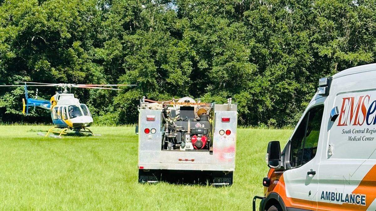 A rescue helicopter arrived after a man became trapped underneath a car he was working on in Jones County, Mississippi, deputies said.