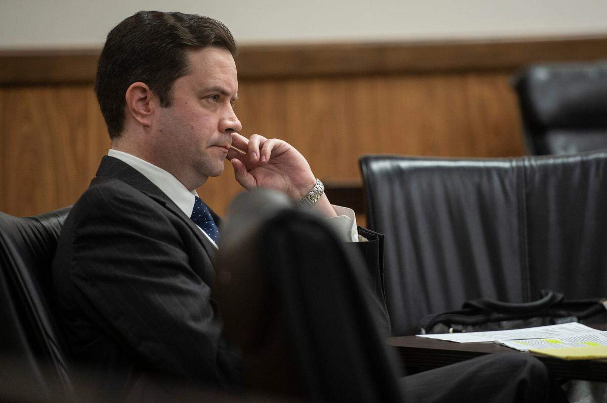 Charles Wimberly, an attorney representing Alan Moran’s father’s company, Philip’s Pest Control, listens as David Baria, the attorney for a Hancock County couple suing Alan Moran over their minor son’s claims that he was sexually assaulted at work, argues against Wimberly’s attempt to stall the litigation process in the civil case in Harrison County Civil Court in Gulfport on Thursday, Sept. 15, 2022. Moran’s lawyers want to wait to proceed with the civil case after the criminal case is completed.
