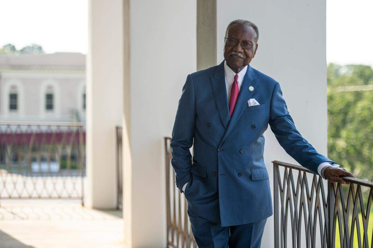 Moss Point Mayor Billy Knight stands on the second floor balcony of City Hall on Wednesday, June 28, 2023. Knight, always a sharp dresser, is known for his leadership skills and decades of public service in the city and Jackson County.