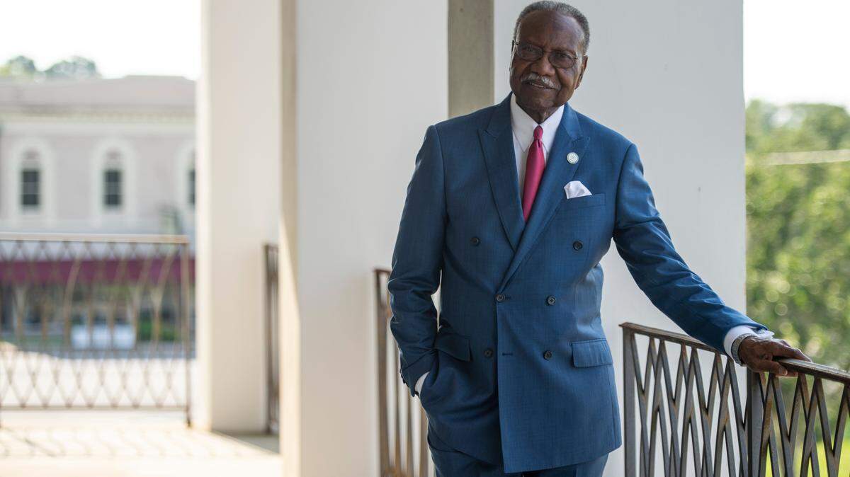 Moss Point Mayor Billy Knight stands on the second floor balcony of City Hall on Wednesday, June 28, 2023. Knight, always a sharp dresser, is known for his leadership skills and decades of public service in the city and Jackson County.