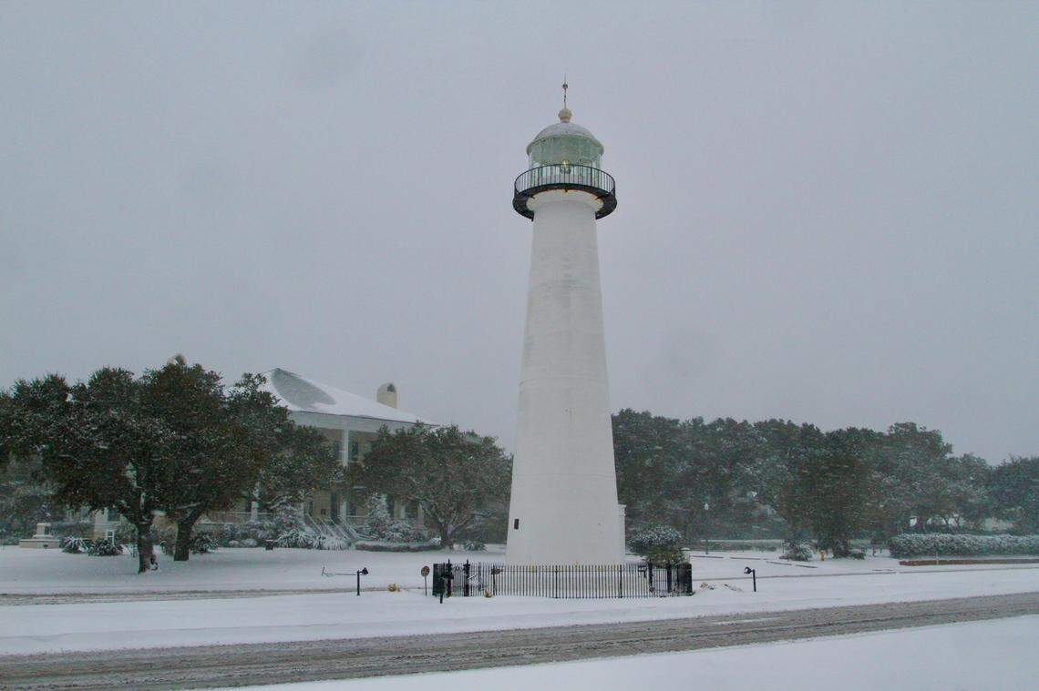 The Biloxi Lighthouse in snow on the early afternoon of Tuesday, Jan. 21, 2025.