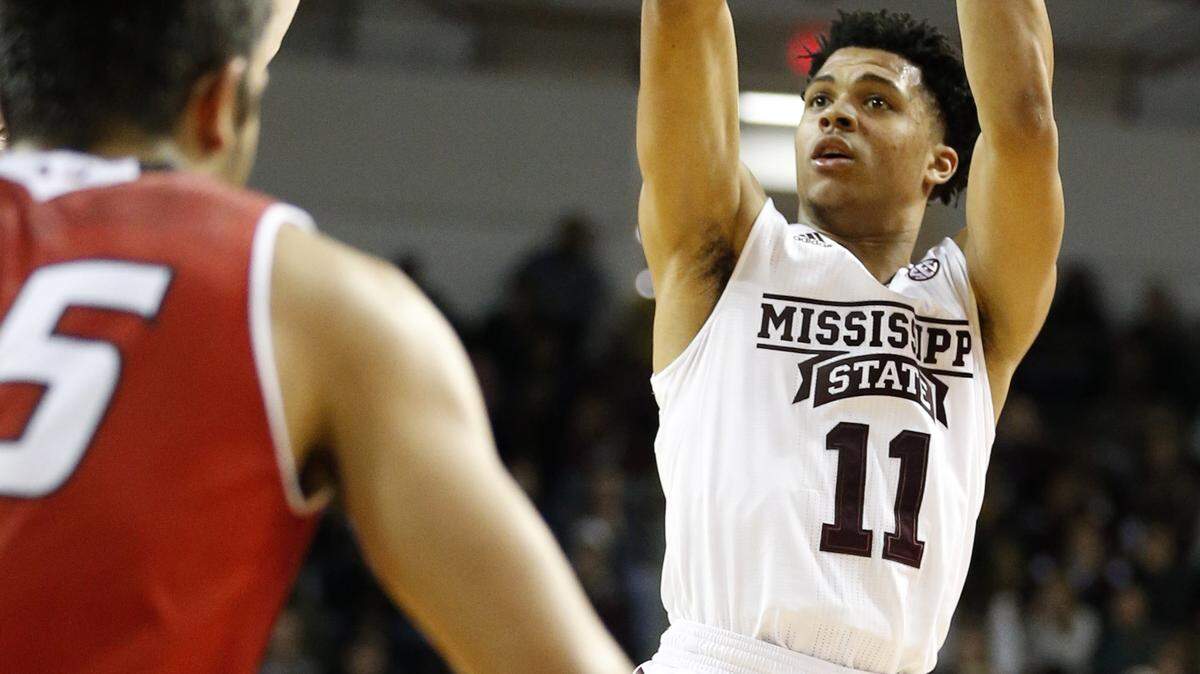 Mississippi State guard Quinndary Weatherspoon (11) attempts to shoot past Eastern Washington during the first half of an NCAA college basketball game in Starkville, Miss., Friday, Nov. 13, 2015. (AP Photo/Rogelio V. Solis)